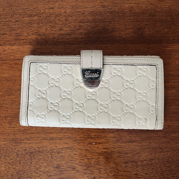Gucci Leather Embossed Wallet - Picture 1 of 8